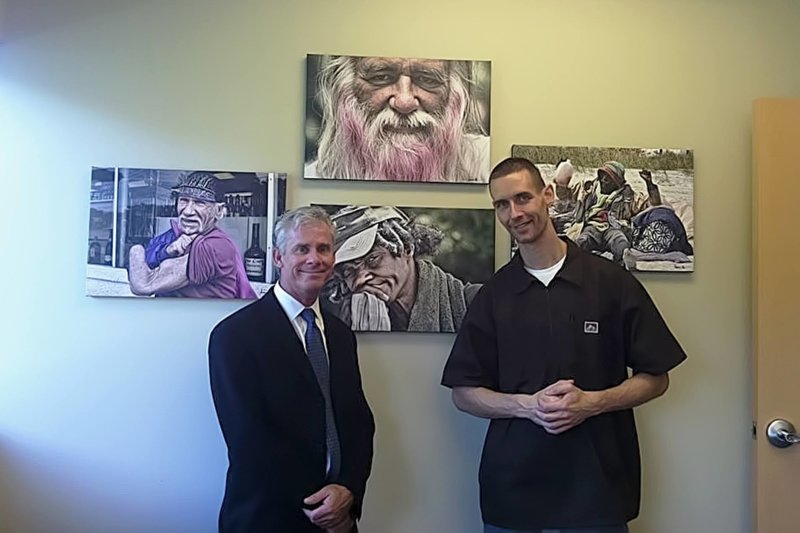 Arpad Lovas and the Director of Nursing at Jacksonville University Dr. Fry. This picture was taken in Dr.Fry's office, the pictures on the wall are photos taken by Arpad.